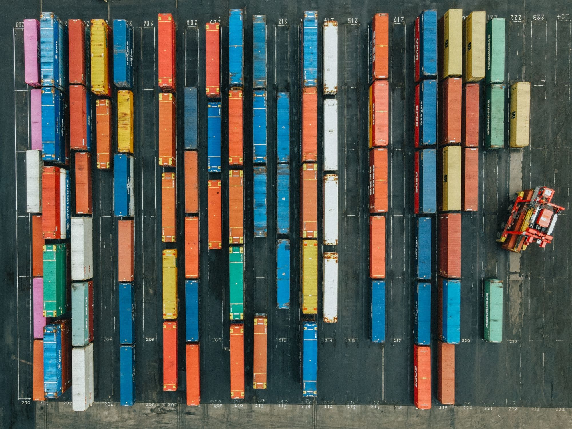 Container ship at a port, seen from above